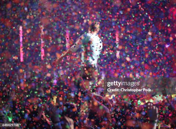 Musician Chris Martin performs onstage at the 2017 iHeartRadio Music Awards which broadcast live on Turner's TBS, TNT, and truTV at The Forum on...