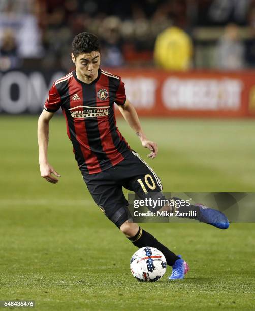 Midfielder Miguel Almiron of Atlanta United dribbles during the game against the New York Red Bulls at Bobby Dodd Stadium on March 5, 2017 in...