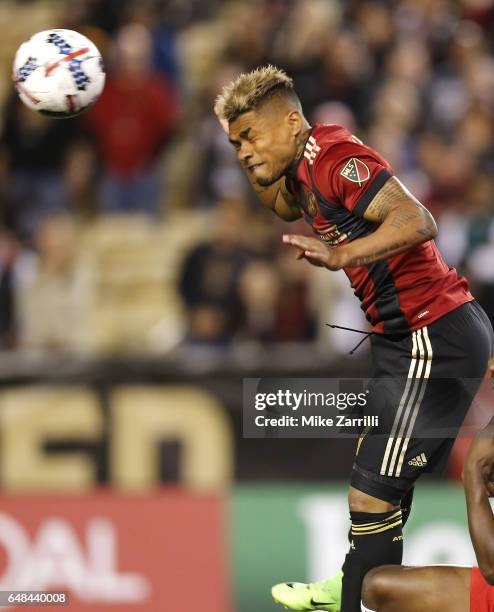 Forward Josef Martinez of Atlanta United heads the ball during the game against the New York Red Bulls at Bobby Dodd Stadium on March 5, 2017 in...