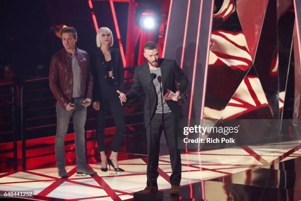 Singer Justin Timberlake accepts the Song of the Year award for 'Can't Stop The Feeling' from actor Jeremy Renner onstage at the 2017 iHeartRadio...