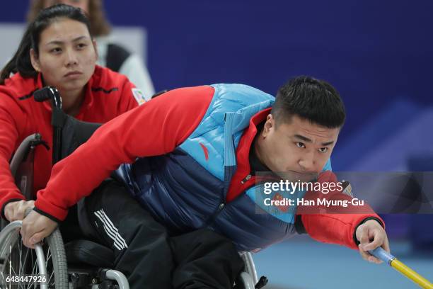 Haitao Wang from China delivers a stone during the World Wheelchair Curling Championship 2017 - test event for PyeongChang 2018 Winter Olympic Games...