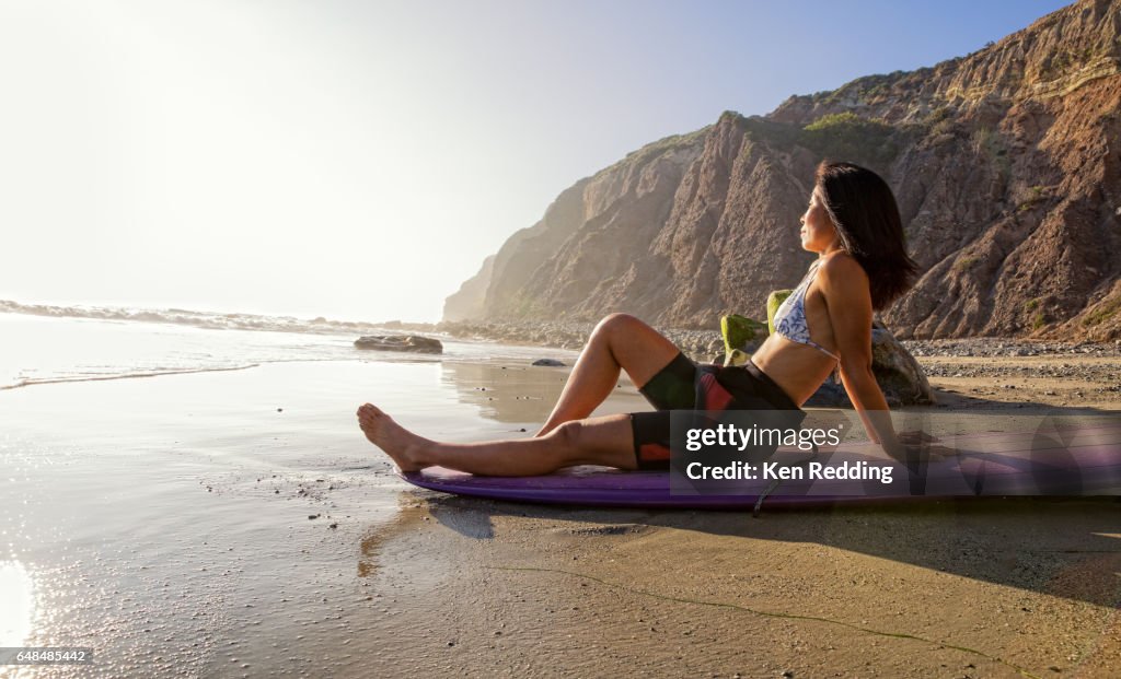 Asian Woman with Surfboard