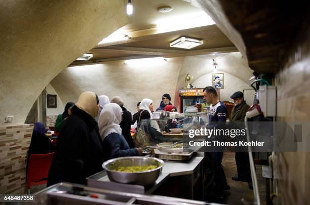Jerusalem, Israel Falafel snack bar, street scene in the Muslim quarter of the historic city center of Jerusalem on February 08, 2017 in Jerusalem,...