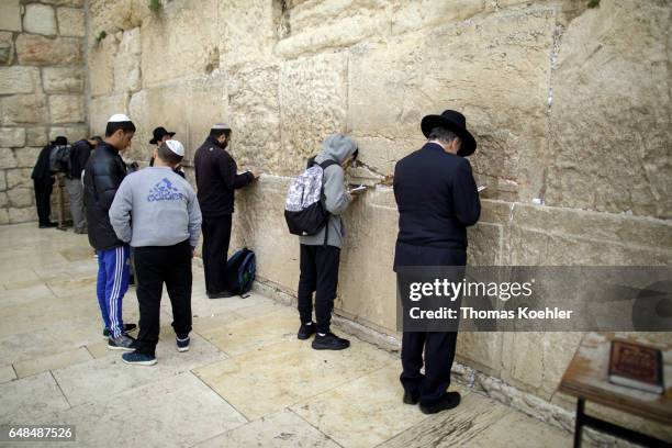 Jerusalem, Israel Jews are praying on the Wailing Wall in the historic city center of Jerusalem on February 08, 2017 in Jerusalem, Israel.