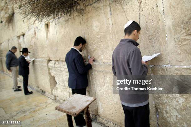 Jerusalem, Israel Jews are praying on the Wailing Wall in the historic city center of Jerusalem on February 08, 2017 in Jerusalem, Israel.