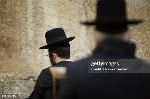 Jerusalem, Israel Jews are praying in a hallway next to the Wailing Wall in the historic city center of Jerusalem on February 08, 2017 in Jerusalem,...