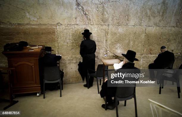 Jerusalem, Israel Jews are praying in a hallway next to the Wailing Wall in the historic city center of Jerusalem on February 08, 2017 in Jerusalem,...