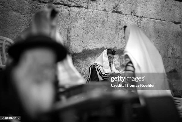 Jerusalem, Israel Jews are praying in a hallway next to the Wailing Wall in the historic city center of Jerusalem on February 08, 2017 in Jerusalem,...