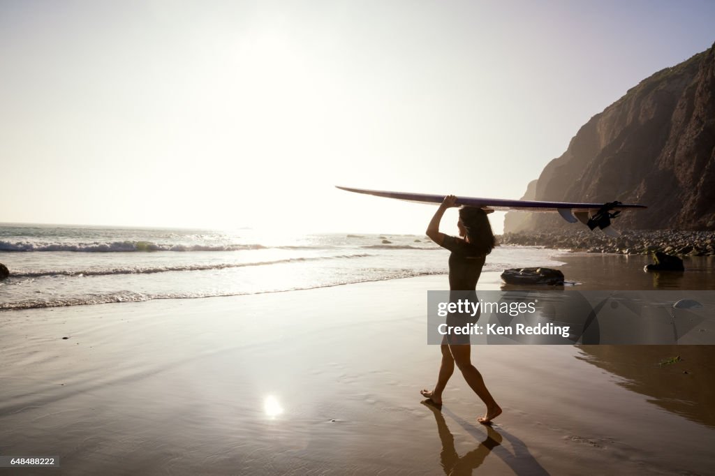 Asian Woman with Surfboard