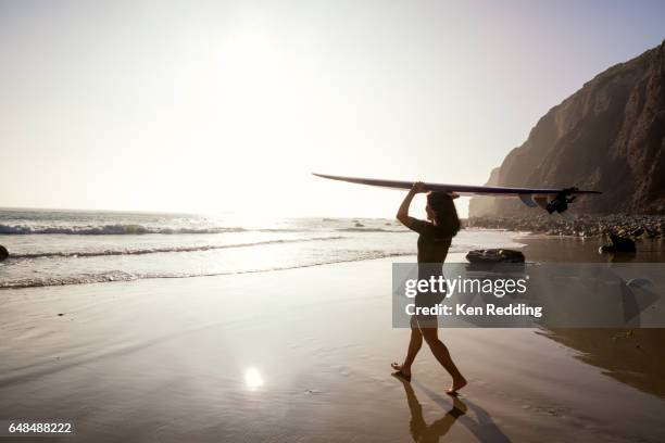 asian woman with surfboard - dana point stock pictures, royalty-free photos & images