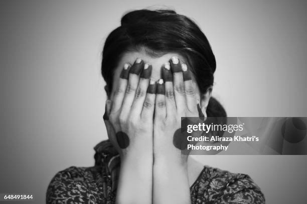 mehndi henna tatoo - hiding face stock pictures, royalty-free photos & images