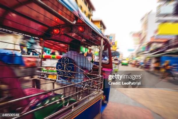 tuk tuk in bangkok khao san road on a rush in the traffic - khao san road stock pictures, royalty-free photos & images