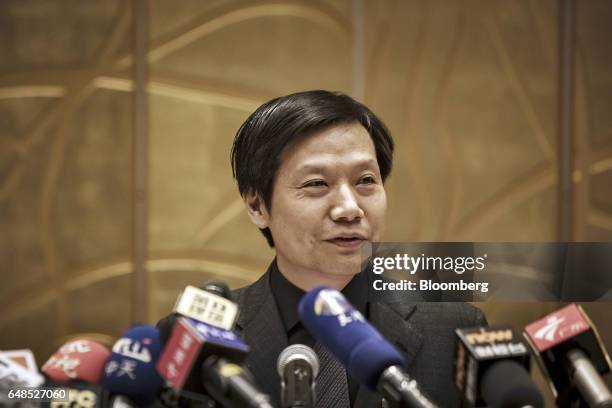 Billionaire Lei Jun, chairman and chief executive officer of Xiaomi Corp., speaks during a news conference on the sidelines of the fifth session of...