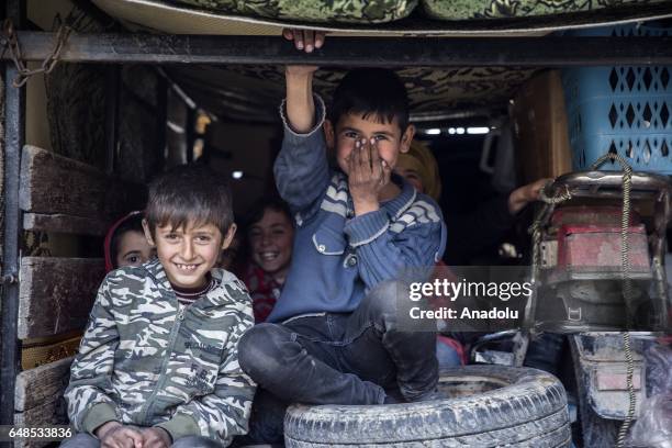 Syrian children who have returned to their home after the Al Bab town center has been entirely freed from Daesh terrorists as part of the "Operation...