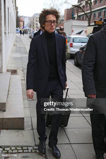 Lars Schlecker son of Anton Schlecker, founder of the now bankrupt German drugstore chain Schlecker, leaves the court after the first day of the...