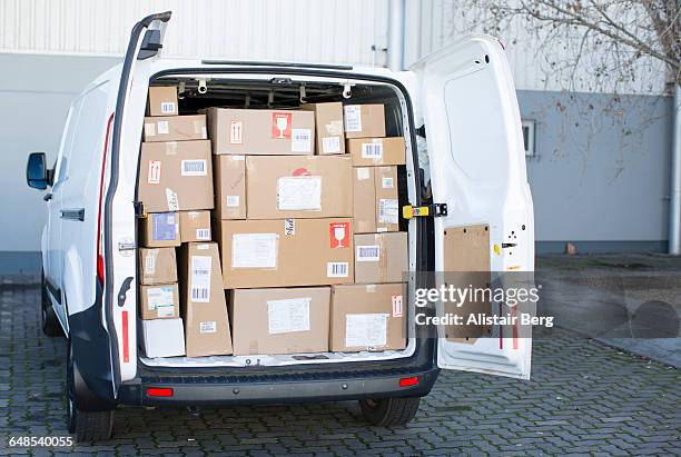 courier van full of parcels and boxes - delivery van stock pictures, royalty-free photos & images