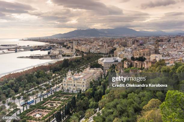 panorama of the city of malaga, spain from the walls and towers of an ancient medieval gibralfaro castle. - alcazaba of málaga stock pictures, royalty-free photos & images