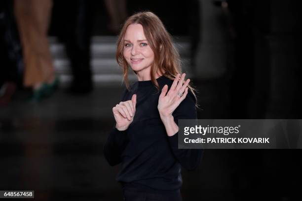 British fashion designer Stella McCartney acknowledges the audience at the end of her women's Fall-Winter 2017-2018 ready-to-wear collection fashion...