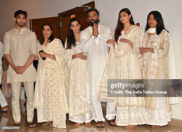 Suniel Shetty with his wife Mana Shetty daughter Athiya Shetty and son Aahan Shetty during his father Veerapa Shetty prayer meeting in Mumbai.