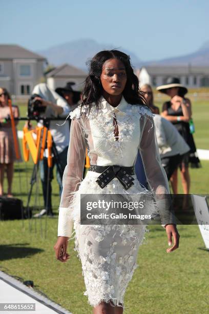 Models showcase fashion during the 2017 Veuve Clicquot Masters Polo at the Val de Vie Estate on March 04, 2017 in Cape Town, South Africa. The...