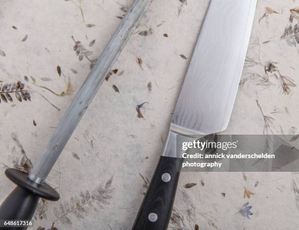 sharpening steel and kitchen knife. - diamond blade stock pictures, royalty-free photos & images