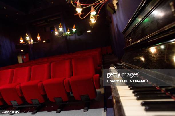 Picture taken on January 12, 2011 in Paris shows the furnishings of the Studio 28 cinema theater. Lights were designed by French artist Jean Cocteau....