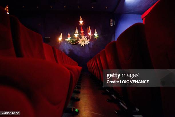 Picture taken on January 12, 2011 in Paris shows the furnishings of the Studio 28 cinema theater. Lights were designed by French artist Jean Cocteau....