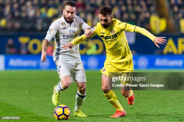 Daniel Carvajal Ramos of Real Madrid battles for the ball with Bojan Jokic of Villarreal CF during their La Liga match between Villarreal CF and Real...