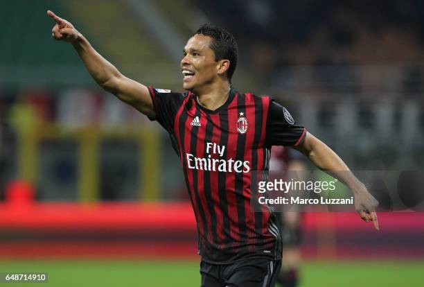 Carlos Bacca of AC Milan celebrates after scoring the opening goal during the Serie A match between AC Milan and AC ChievoVerona at Stadio Giuseppe...