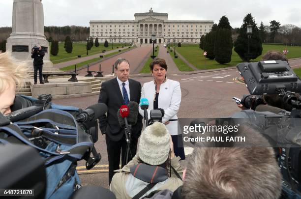 Democratic Unionist Party leader Arlene Foster, and DUP Deputy Leader Nigel Dodds address the media outside the Parliament Buildings at Stormont in...
