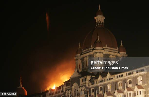 Mumbai Under Terror Attack - Firing - Fire at Taj hotel the fire occured on the second day. The reason of the fire is reportedly said due to the...