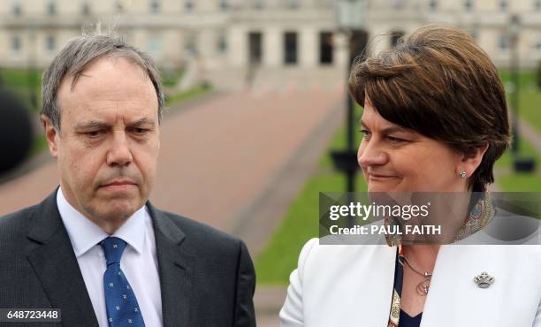 Democratic Unionist Party leader Arlene Foster, and DUP Deputy Leader Nigel Dodds address the media outside the Parliament Buildings at Stormont in...