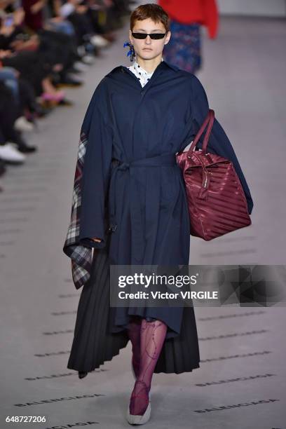 Model walks the runway during the Balenciaga Ready to Wear fashion show as part of the Paris Fashion Week Womenswear Fall/Winter 2017/2018 on March...