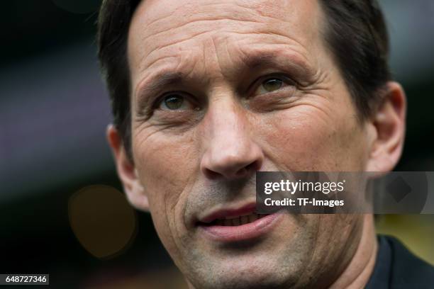 Head coach Roger Schmidt of Bayer Leverkusen looks on during the Bundesliga match between Borussia Dortmund and Bayer 04 Leverkusen at Signal Iduna...