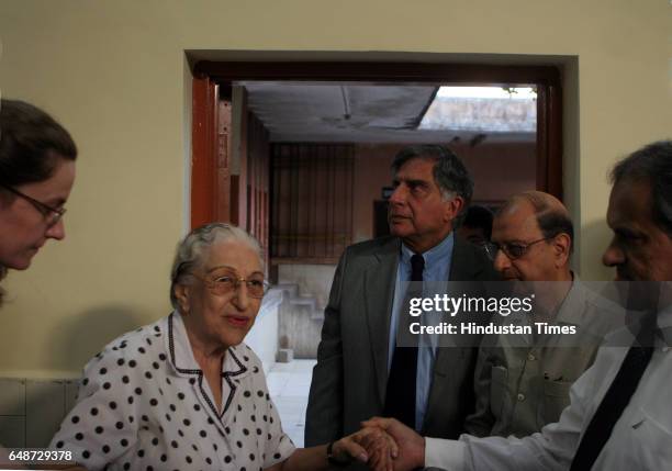 Funeral - Ratan Tata alongside Tata employees during the cremation of Jamshed Jehangir Bhabha at Chandanwadi crematorium on Wednesday