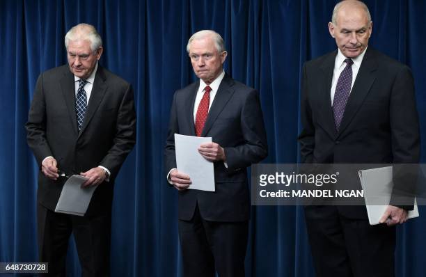 Secretary of State Rex Tillerson, Attorney General Jeff Sessions, and Homeland Security Secretary John Kelly arrive to deliver remarks on visa travel...