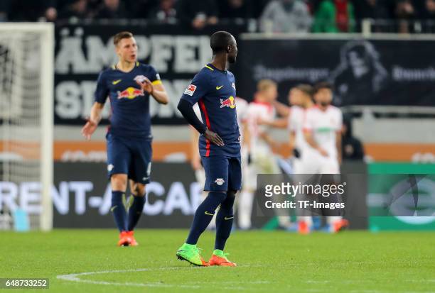 Naby Deco Keita of Leipzig Willi Orban of Leipzig looks dejected during the Bundesliga match between FC Augsburg and RB Leipzig at WWK Arena on March...