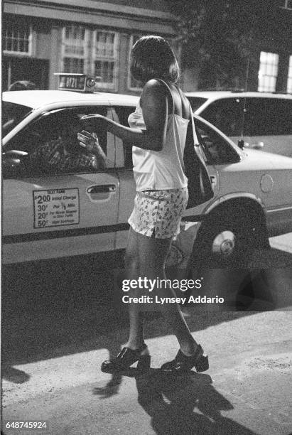 Cab picks up a transgendered prostitute in the meatpacking district in New York City in 1999. Although cab drivers complain that transgendered...