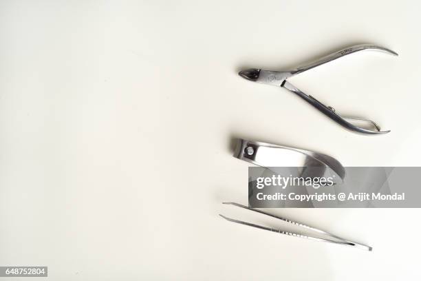 manicure pedicure service top view with white copy space - nail scissors stock pictures, royalty-free photos & images