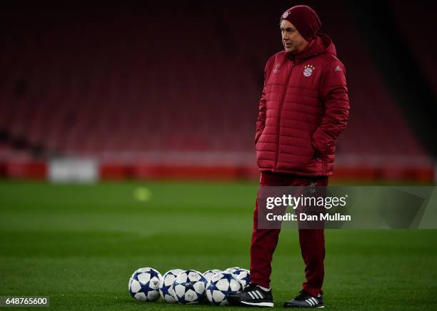Carlo Ancelotti the head coach of Bayern Muenchen watches over his players during the FC Bayern Muenchen training session at the Emirates Stadium on...