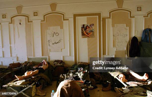 United States troops from the 101st Airbourne Division sleep in the Division Main Headquarters in one of Saddam Hussein's former palaces in Mosel,...