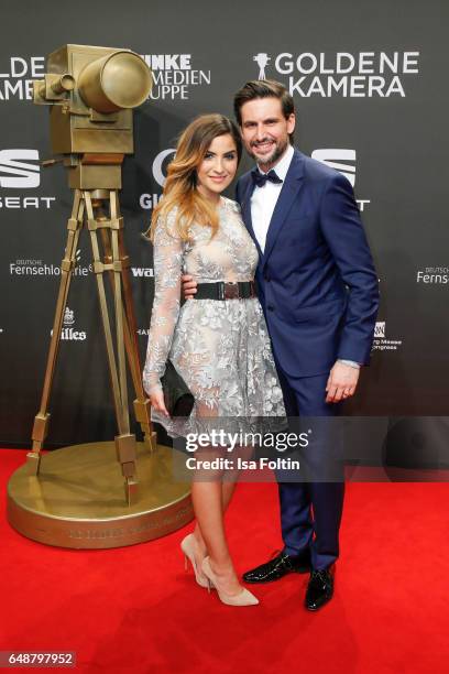 German actor Tom Beck and his girlfriend Chryssanthi Kavazi arrives for the Goldene Kamera on March 4, 2017 in Hamburg, Germany.