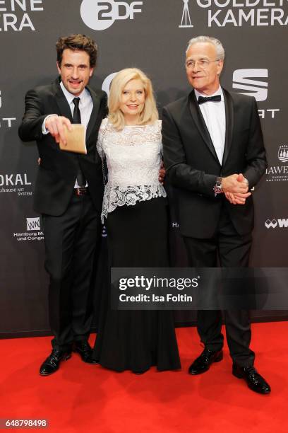 Oliver Mommsen, Sabine Postel and Christoph M. Ohrt arrive for the Goldene Kamera on March 4, 2017 in Hamburg, Germany.