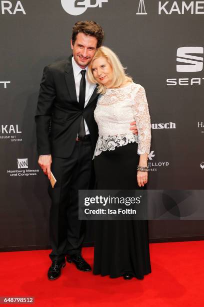 Oliver Mommsen and Sabine Postel arrive for the Goldene Kamera on March 4, 2017 in Hamburg, Germany.