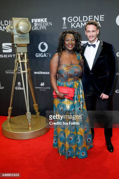 German actor Vladimir Burlakov and Thelma Buabeng arrive for the Goldene Kamera on March 4, 2017 in Hamburg, Germany.