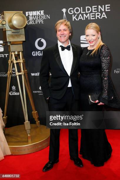 English musician Steve Normanand Sabrina Winter arrive for the Goldene Kamera on March 4, 2017 in Hamburg, Germany.