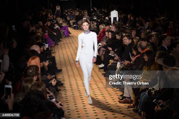 Model walks the runway during the Esteban Cortazar show as part of the Paris Fashion Week Womenswear Fall/Winter 2017/2018 on March 6, 2017 in Paris,...