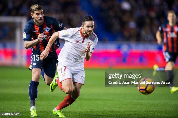 Pablo Sarabia of Sevilla FC duels for the ball with Theo Hernandez of Deportivo Alaves during the La Liga match between Deportivo Alaves and Sevilla...