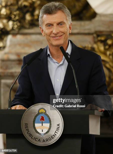 President of Argentina Mauricio Macri smiles during a press conference to announce the opening of biddings for commercial air transport allowing low...