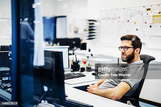 engineer in control room of a factory - workplace surveillance stock pictures, royalty-free photos & images